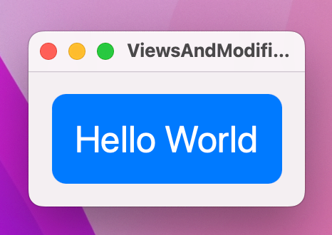 A blue rounded rectangle containing the words Hello World in white.