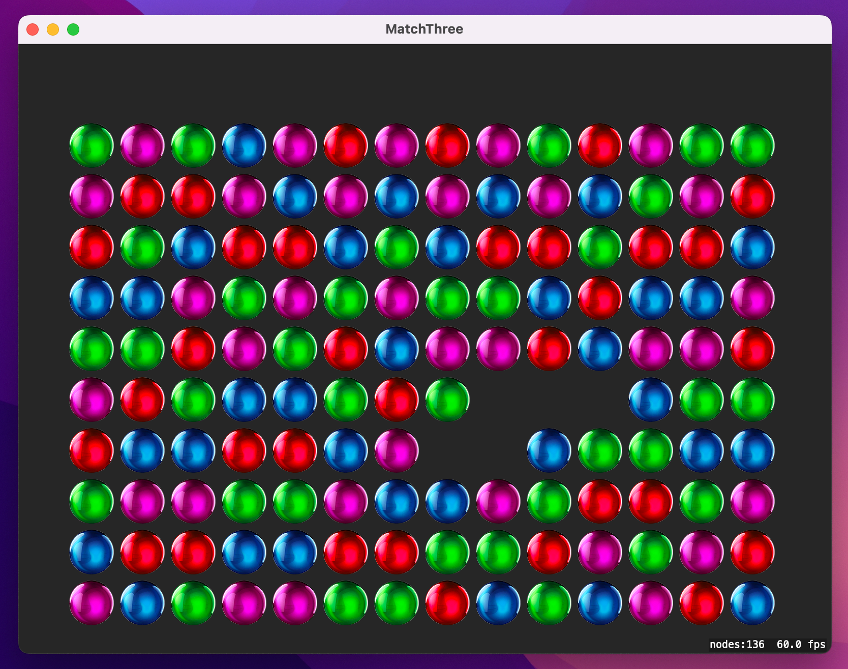 A grid of colorful balls, with a hole in the grid where some balls are missing.