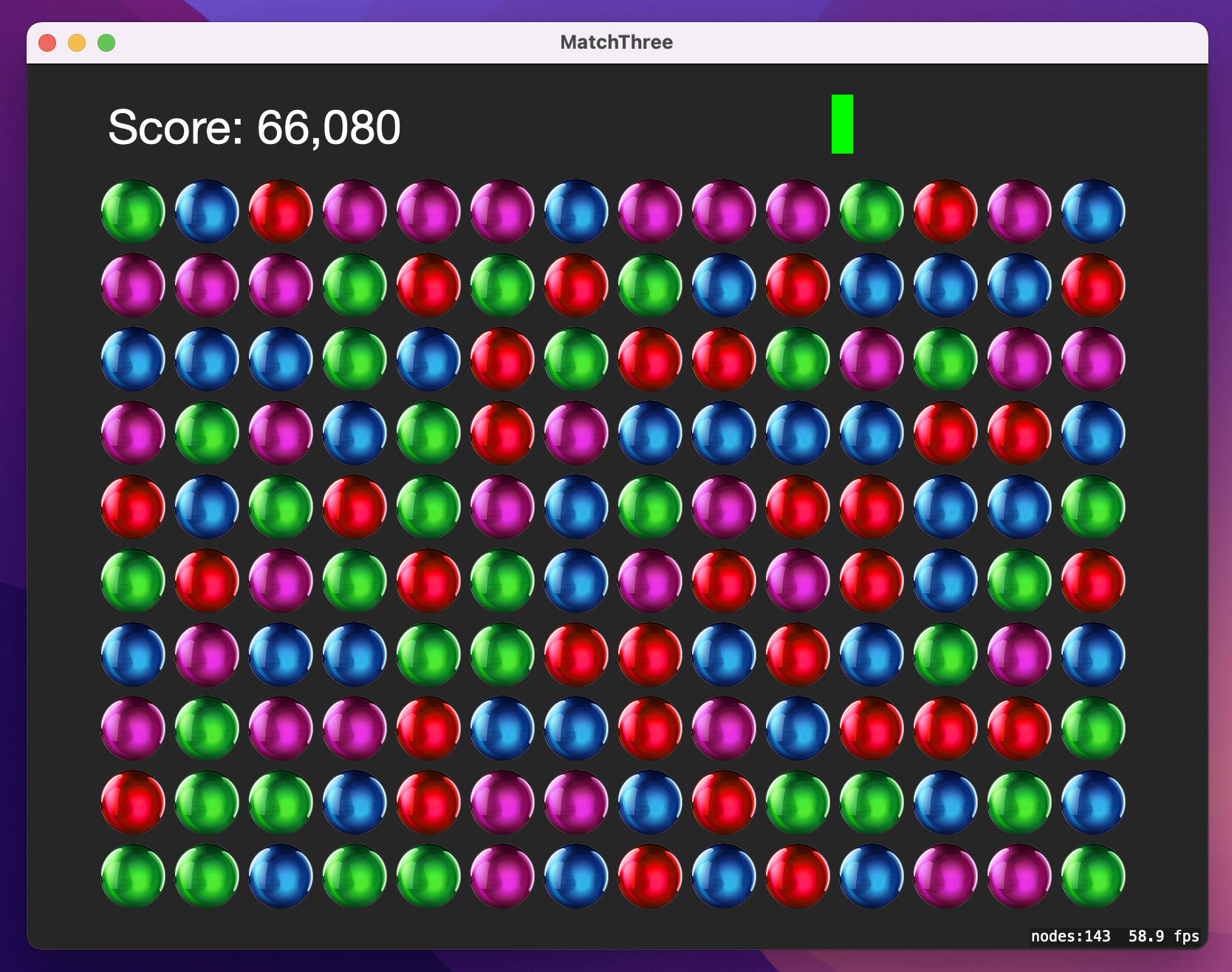 A grid of colorful balls, above which is 'Score: 66,080' and a thin green bar.